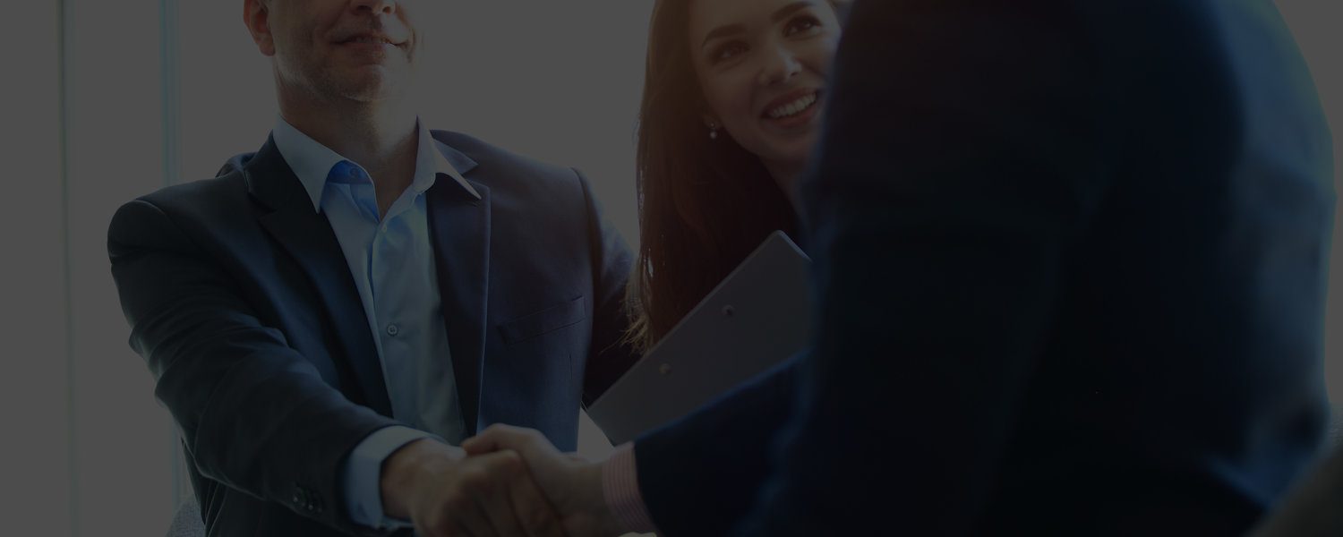 Business people shaking hands, finishing up a meeting